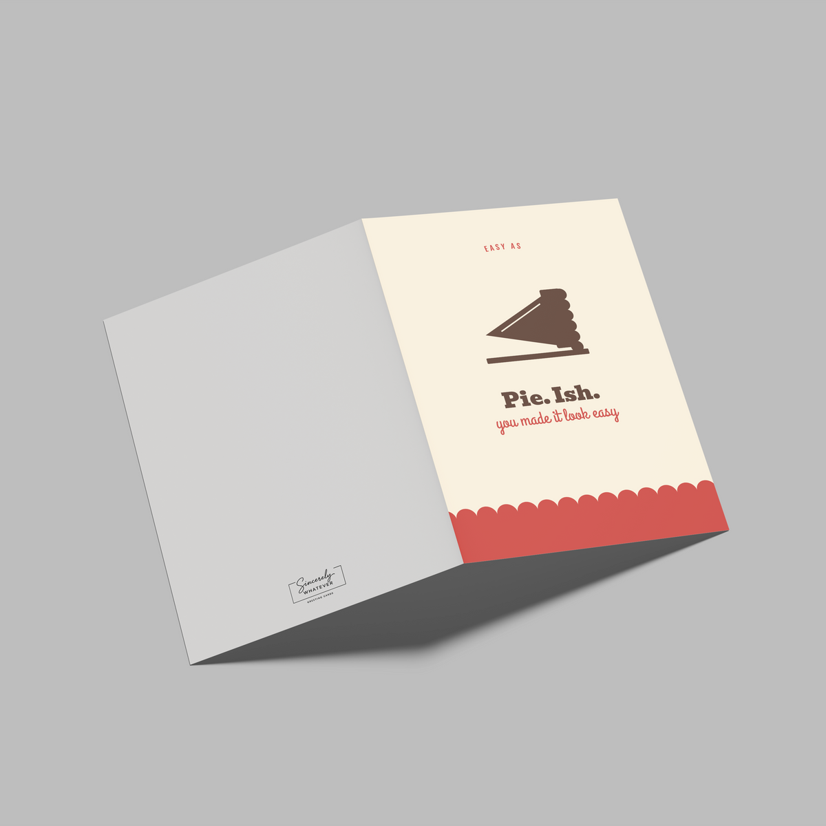 A folded brochure or card shown open on a plain gray background. The left panel is light gray, and the right panel is cream with a dark brown gavel icon, the text 'Pie.