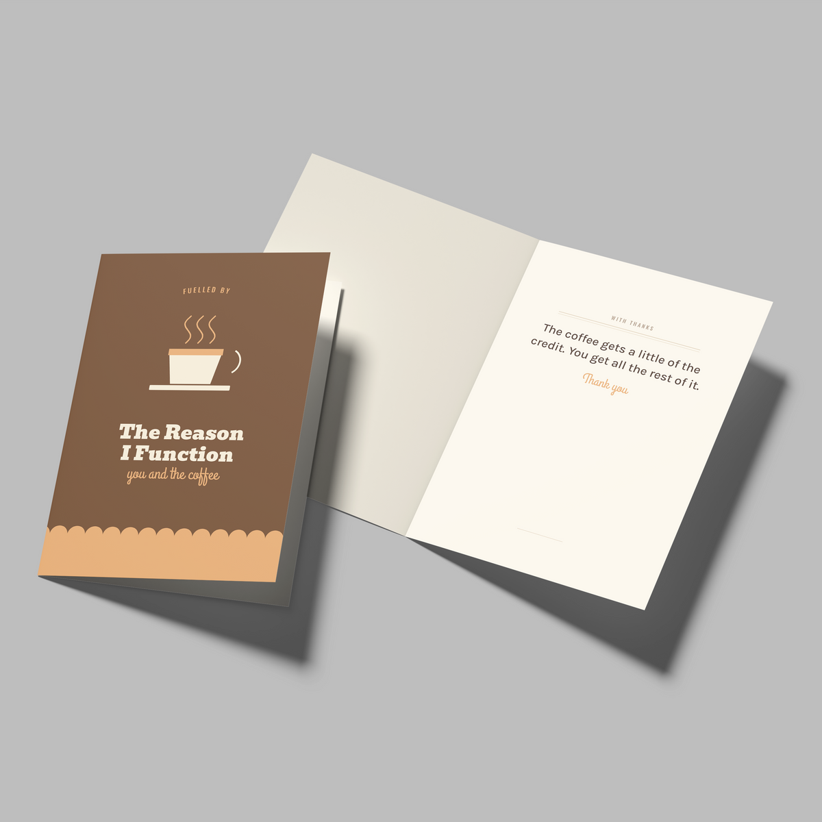 A folded greeting card set shown on a light gray background. One card is closed and features a brown cover with a coffee cup illustration and the text 'The Reason I Function' and 'you are the coffee'.
