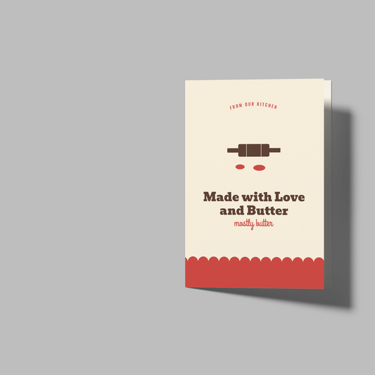 A mockup of a recipe card or booklet cover next to two open blank white folded sheets on a solid gray background. The cover is cream with a red bottom band and black text reading 'Made with Love and Butter' and 'easy baking'.