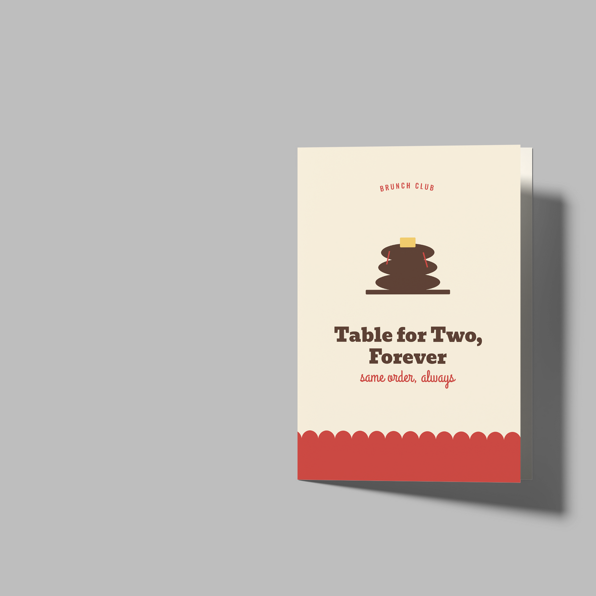 A mockup showing a small printed card or booklet with a cream cover, a brown stacked-coffee graphic, and the text 'Table for Two, Forever' on a light gray background, alongside two blank white folded card templates.
