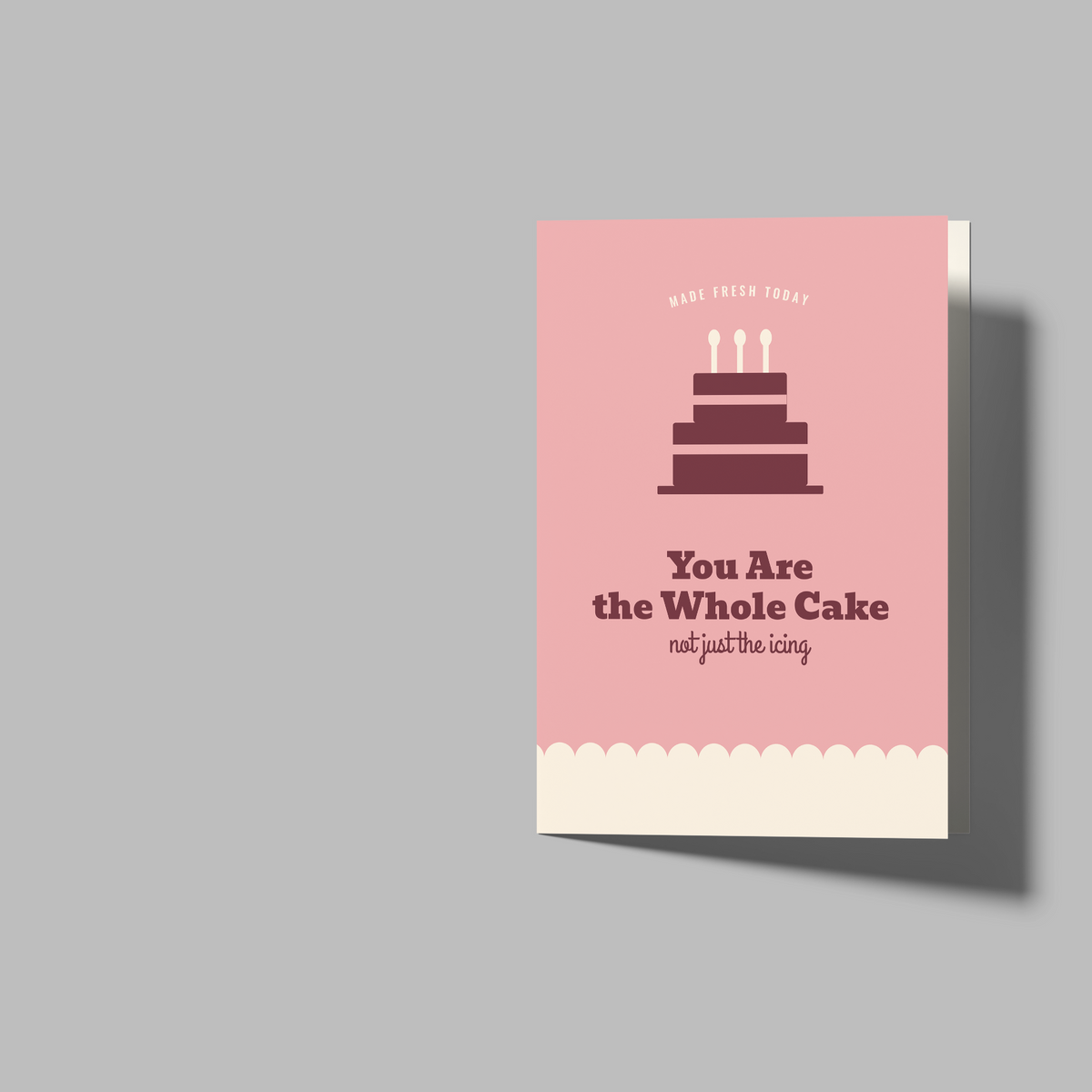 A greeting card set shown on a light gray background, including one closed card with a pink birthday design and two open blank white cards.